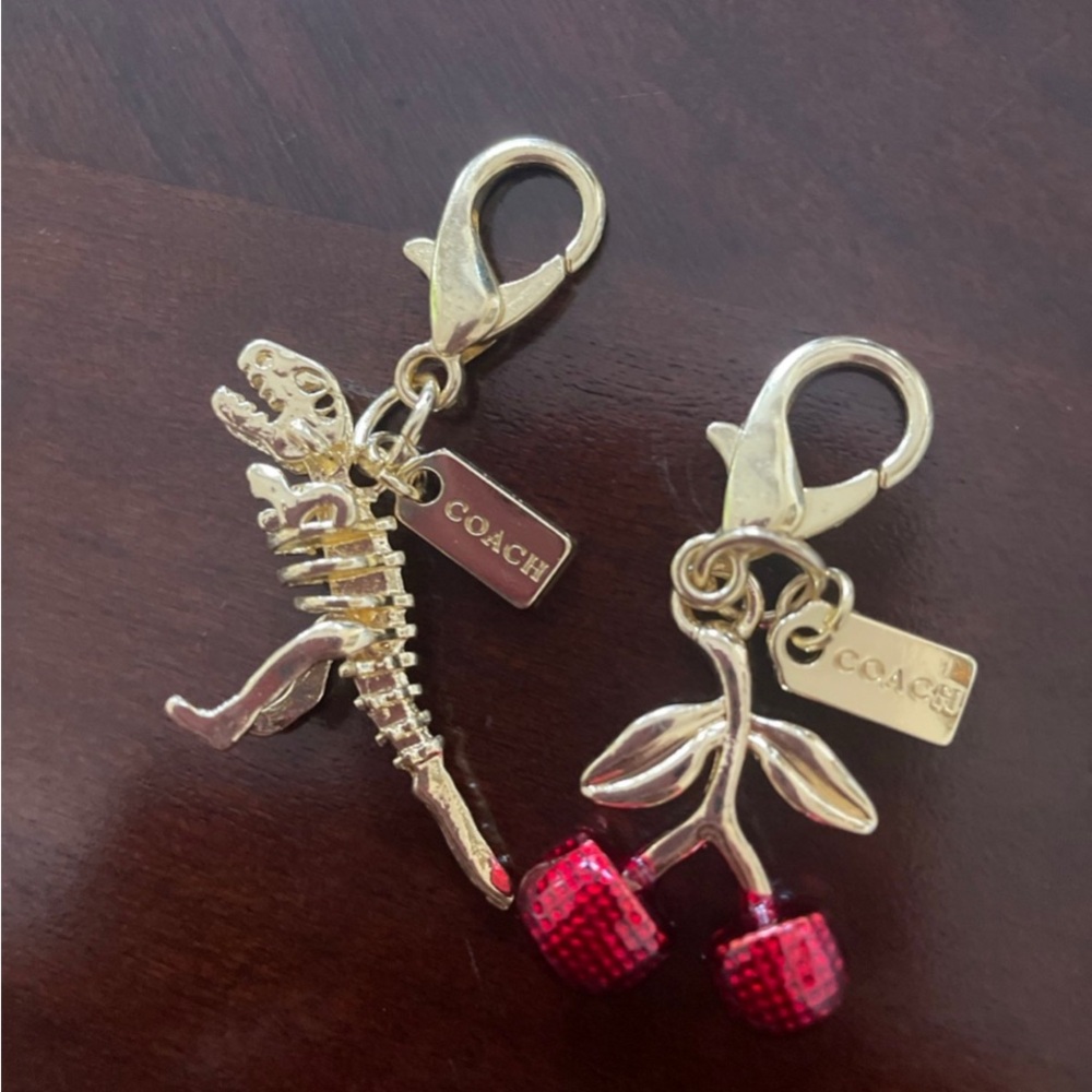 Coach Gold Dinosaur and Cherry Key Holders